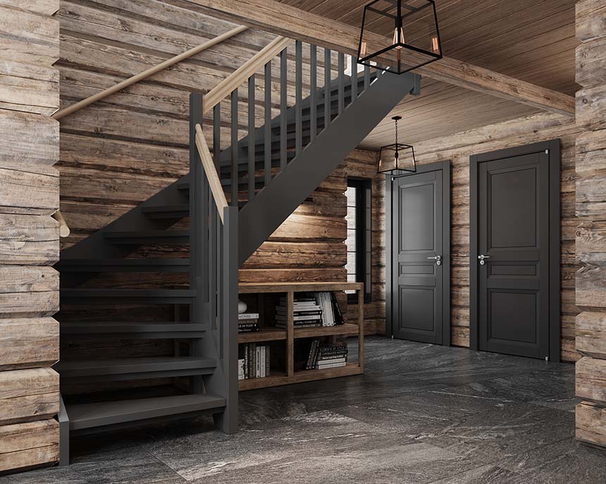 Stilfullt kontor med skrivebord under trapp