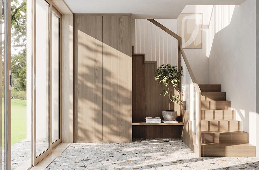 Matt svart trapp i tømmerhus